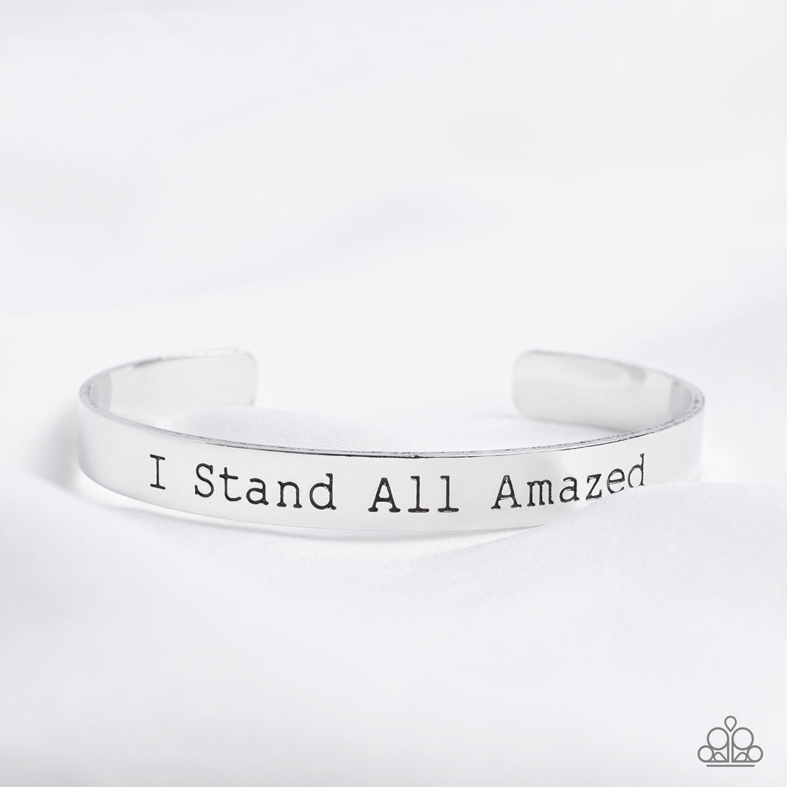Paparazzi Accessories - I Stand All Amazed - Silver Inspirational Bracelets a simplistic, shiny, silver cuff is stamped with the phrase "I Stand All Amazed," for a divine, light-catching design across the wrist.  Sold as one individual bracelet.