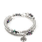 Chiseled pieces of hematite, oil spill stones, and silver beads of various sizes are threaded along a long wire to create an infinity wrap bracelet. Hanging from the end of the design, a silver charm with a smoky star and silver studs completes the shimmering prismatic design around the wrist. Coil design allows for an adjustable fit. Due to its prismatic palette, color may vary.  Sold as one individual bracelet.