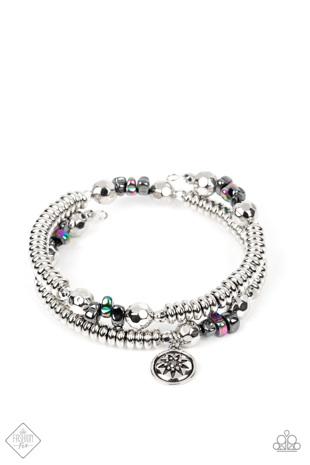 Chiseled pieces of hematite, oil spill stones, and silver beads of various sizes are threaded along a long wire to create an infinity wrap bracelet. Hanging from the end of the design, a silver charm with a smoky star and silver studs completes the shimmering prismatic design around the wrist. Coil design allows for an adjustable fit. Due to its prismatic palette, color may vary.  Sold as one individual bracelet.