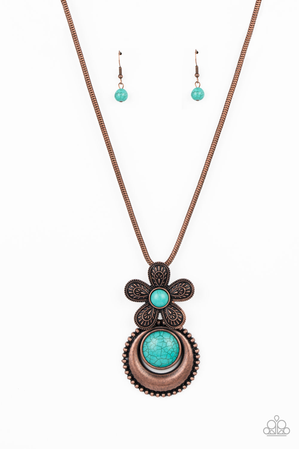 Paparazzi Accessories - Bohemian Blossom fluttering from a copper snake chain, an oversized flower with detailed petals blooms around a turquoise stone center. A copper pendant with a studded border swings from the single flower for additional movement. A refreshing oversized stone in the same hue is pressed into the center of the pendant for a pop of color amongst the metallic texture. Features an adjustable clasp closure. As the stone elements in this piece are natural, some color variation is normal.