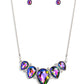 Paparazzi Accessories - Regally Refined - Multi Life of the Party Necklaces featuring a stellar UV shimmer, dramatic teardrop gems, gliding from a sleek, silver snake chain, are pressed into high-sheen silver casings, creating a colorful fringe below the collar. Linking each teardrop together, dainty white rhinestones border the tops and bottoms of each shape, creating additional eye-catching dazzle. Features an adjustable clasp closure. Due to its prismatic palette, color may vary.