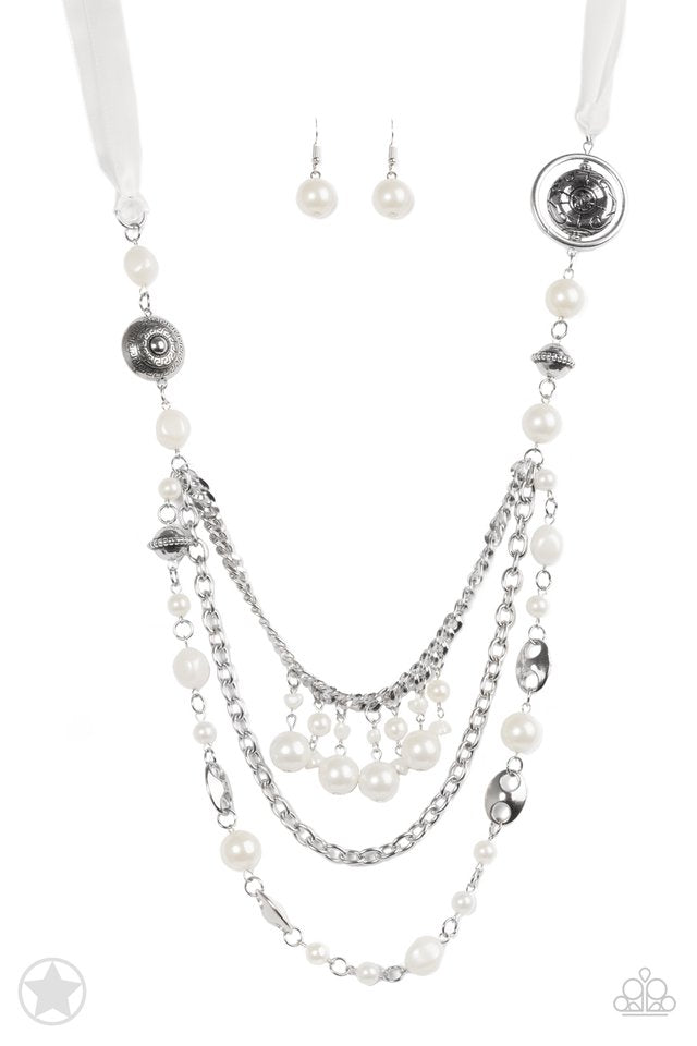 Paparazzi Accessories All the Trimmings - White Necklaces a silky ivory ribbon replaces a traditional chain to create an elegant look. Pearly ivory beads and funky silver pieces intermix with varying lengths of silver chains to give a fresh take on a Victorian-inspired piece.