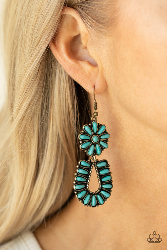 Paparazzi Accessories Badlands Eden - Brass Earrings infused with studded brass fittings, two turquoise stone frames connect into a squash blossom for an authentically southwestern inspired look. Earring attaches to a standard fishhook fitting.