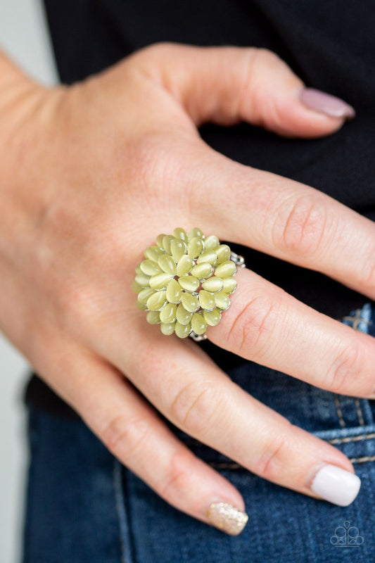 Paparazzi Accessories - Blooming Bloomer - Yellow Rings row after row of teardrop cat's eye stones stack into a blast of yellow petals atop the finger, creating a whimsical blossom. Features a stretchy band for a flexible fit.  Sold as one individual ring.