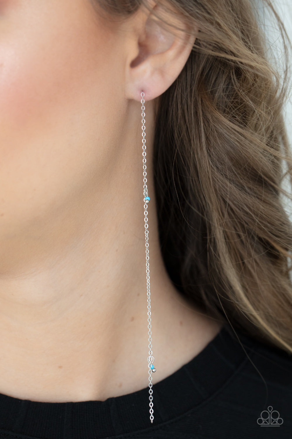 Dauntlessly Dainty - Blue Earrings pairs of dainty silver and Cerulean seed beads trickle along a lengthened silver chain, creating an extended chandelier. Earring attaches to a standard post fitting.  Sold as one pair of post earrings.  Paparazzi Jewelry is lead and nickel free so it's perfect for sensitive skin too!