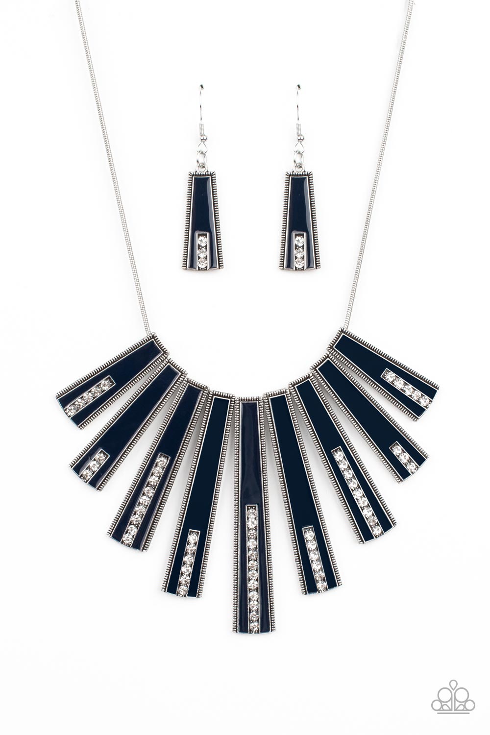 FAN-tastically Deco - Blue Necklaces encased in daintily dotted silver frames, a row of flared silver bars painted in a glossy Navy Blue fans out across the collar. A column of sparkling white rhinestones rises from the bottom of each frame, creating a dramatically deco finish as they sway from a round silver chain. Features an adjustable clasp closure.  Sold as one individual necklace. Includes one pair of matching earrings.  Paparazzi Jewelry is lead and nickel free so it's perfect for sensitive skin too!