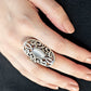 Paparazzi Accessories GLEAM Big - Silver Rings a glowing cat's eye stone is pressed into the center of an oval backdrop swirling with vine-like filigree for a whimsical look. Features a stretchy band for a flexible fit.