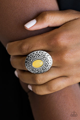 Paparazzi Accessories - Hello Sunshine - Yellow Stone Rings  A glowing yellow stone is pressed in the center of a dramatic silver frame radiating with shimmery sunburst details for a seasonal look. Features a stretchy band for a flexible fit.  Sold as one individual ring.