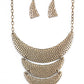 Moonwalk Magic - Brass Hammered Necklaces hammered in an antiqued brass dimpled texture, a trio of crescent shaped plates in graduating sizes stack one above the other and connect to a brass chain for a boldly modern fashion below the collar. Features an adjustable clasp closure.  Sold as one individual necklace. Includes one pair of matching earrings.  Paparazzi Jewelry is lead and nickel free so it's perfect for sensitive skin too!
