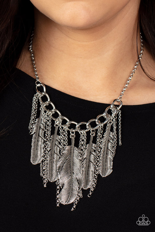NEST Friends Forever - Silver Feather Earrings infused with lifelike textures, an oversized assortment of silver feathers alternate with free-falling silver chains along a chunky section of silver chain, creating a free-spirited fringe. Features an adjustable clasp closure.  Sold as one individual necklace. Includes one pair of matching earrings.