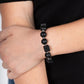 Paparazzi Accessories - Timber Trendsetter - Black Wood Bracelet infused with dainty silver beads, an earthy collection of round and cube black wooden beads are threaded along a stretchy band around the wrist for a natural look.  Sold as one individual bracelet.