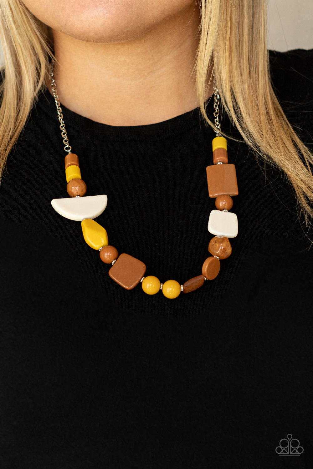 Paparazzi Accessories Tranquil Trendsetter - Yellow Acrylic Necklaces featuring the rustic hues of Adobe, Mustard, and Soybean, mismatched acrylic and faux rock beads are haphazardly threaded along an invisible wire below the collar for an abstract artisan vibe. Features an adjustable clasp closure.