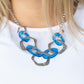 Urban Circus - Blue Acrylic Necklaces an asymmetrical assortment of neon blue acrylic rings and hammered silver hoops boldly interlock below the collar, creating an intense pop of color. Features an adjustable clasp closure.
