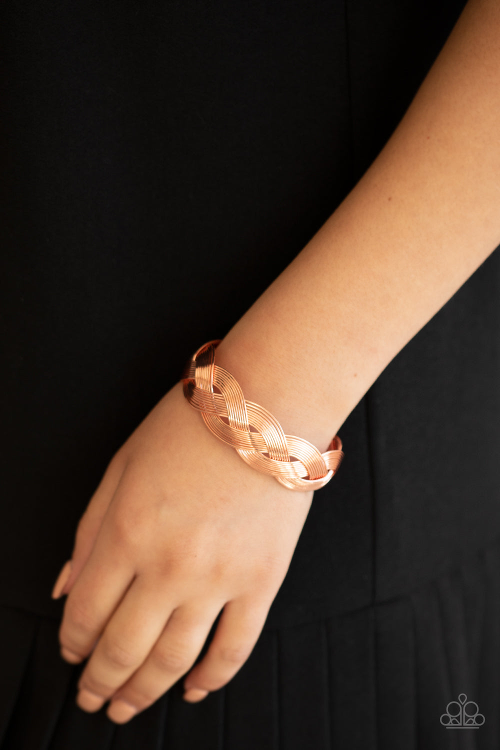 Woven Wonder - Copper Cuff Bracelets attached to two shiny copper fittings, rows of dainty shiny copper wire weave around the wrist, creating a boldly braided cuff.  Sold as one individual bracelet.