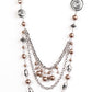 Brown Necklaces a silky brown ribbon replaces a traditional chain to give an elegant look. Pearly brown beads and funky silver pieces intermix with varying lengths of silver chains to give a fresh take on a Victorian-inspired piece.