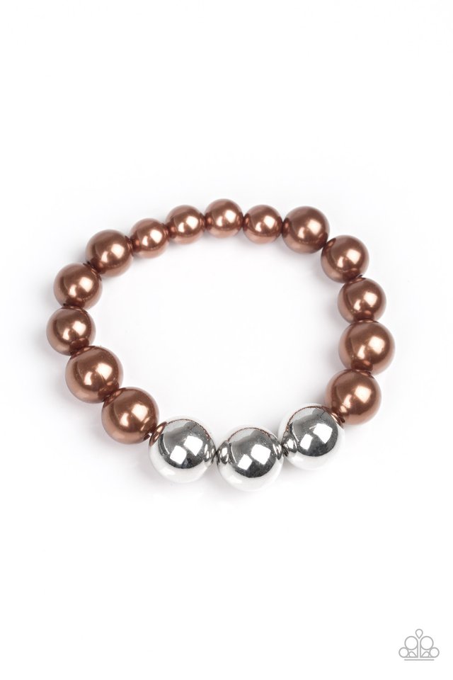 Paparazzi Accessories All Dressed UPTOWN - Brown Bracelets gradually increased in size near the center, oversized pearly brown and shiny silver beads are threaded along a stretchy band around the wrist for a glamorous finish.
